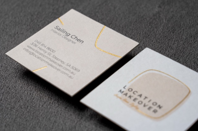 A light card pair with a thin gold arc and quiet typographic composition.