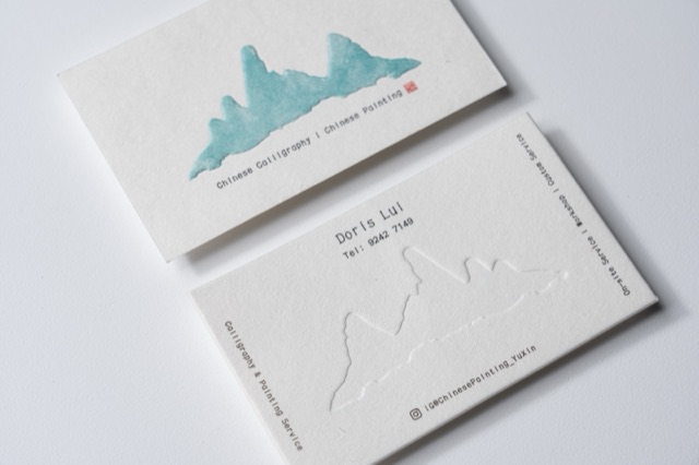 Pale cards combining a coloured mountain silhouette with a tone-on-tone mountain contour.