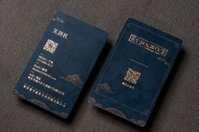 Deep blue cards with rounded corners and reflective gold-coloured border details.