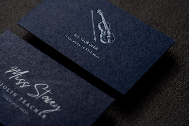 Deep blue cards with fine pale metallic-looking linework and lettering.