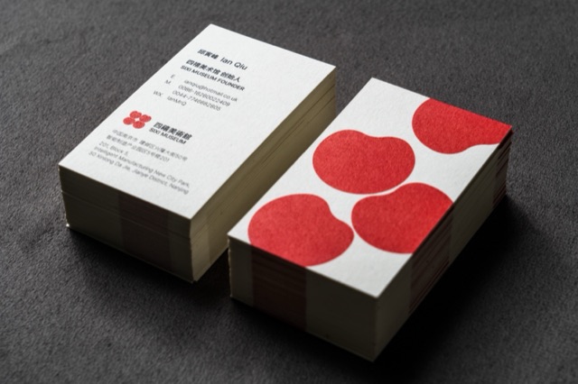 Two substantial card stacks, one showing large red circles on a white face.