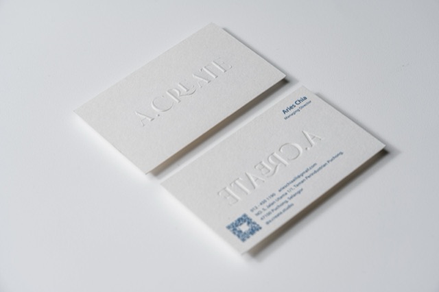 A light card pair using large white-on-white lettering and small dark details.